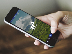 iPhone 6 Mobile in Hand Mockup